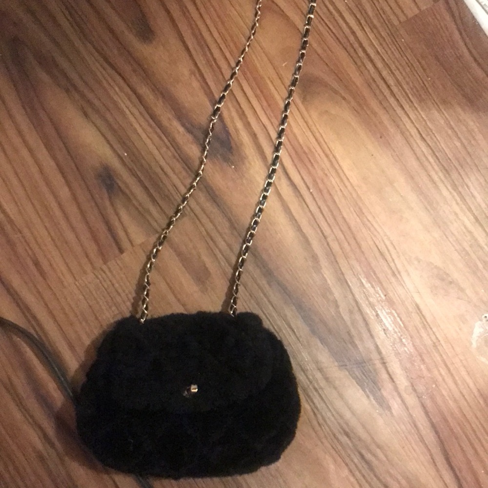 Black furry purse